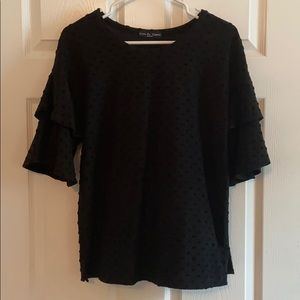 3/4 length black on black polka dot shirt